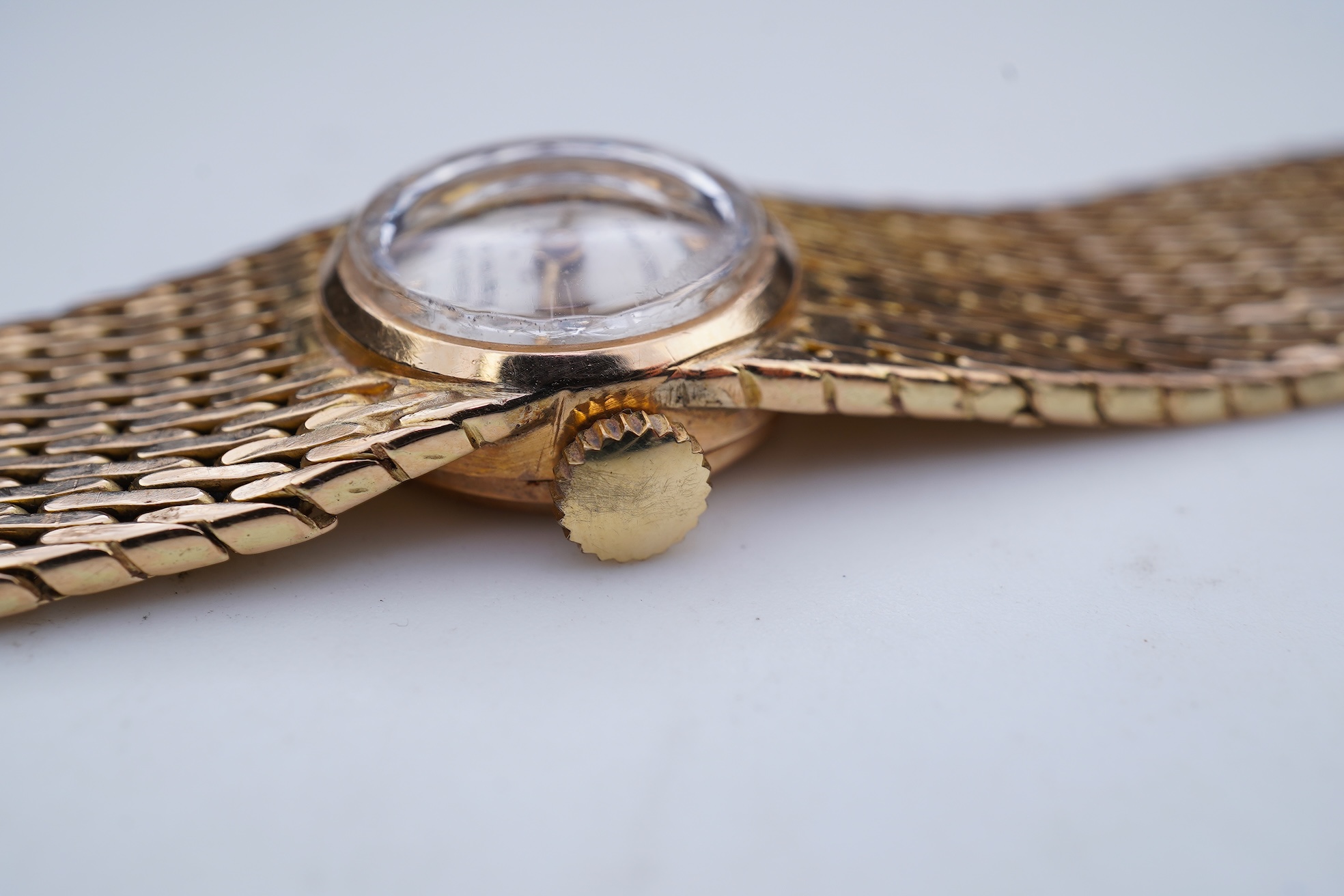 Ermaten, a gold watch